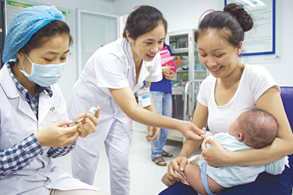 What is the fine for health facilities failing to monitor vaccinees for at least 30 minutes after vaccination in Vietnam? 