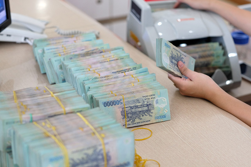 Từ ngày 15/3/2023, giảm 0,5% lãi suất cho vay ngắn hạn tối đa bằng đồng Việt Nam